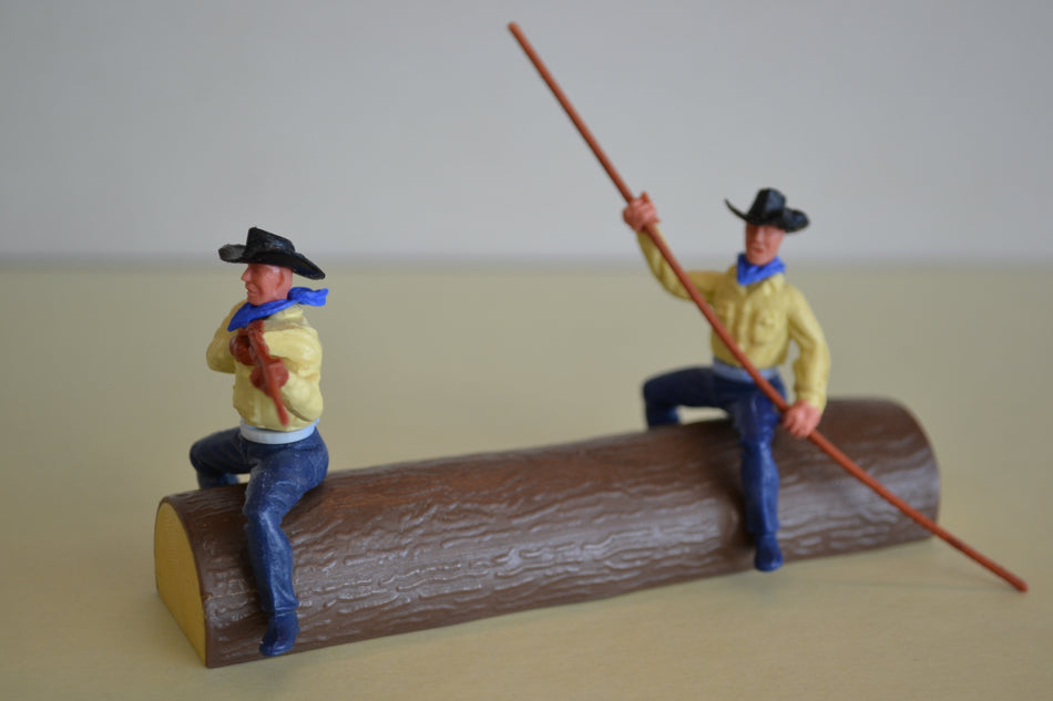 Timpo Cowboys on Log